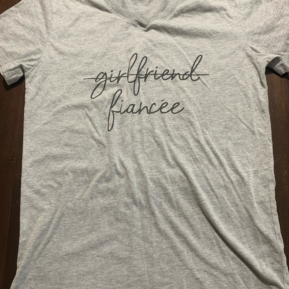Gray v neck girlfriend to fiancé tee. Medium. Worn once. Smoke free home